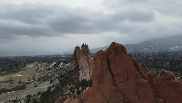 Snow Covered Garden of the Gods, Winter/Fall, natural rock Formation, 8th Wonder of the World. 4K aerial video, located in Colorado Springs, Colorado, USA. 