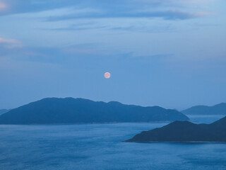 a moon raise of Silverstrand at Port Shelter