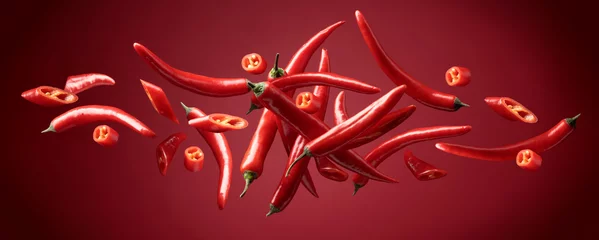 Crédence de cuisine en verre imprimé Piments forts Red chili peppers in movement.
