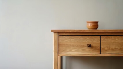 A detailed close-up of a wooden table with drawers, showcasing the rich wood texture against a sleek gray wall: photorealistic illustration, Generative AI