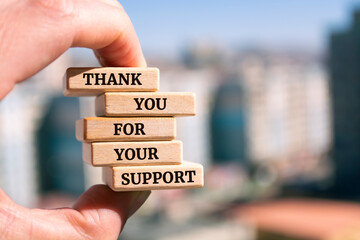 Wooden blocks with words 'Thank you For Your Support'.