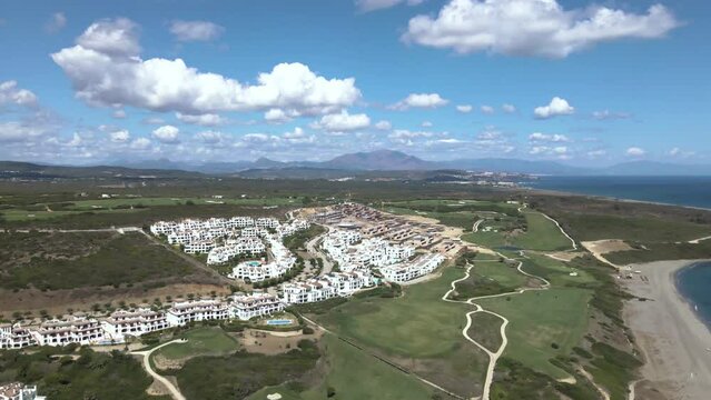 Beachfront Golf Course on Coastline of Cadiz, Spain - Aerial Landscape