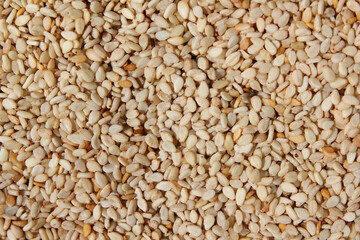 Heap of organic natural sesame seeds