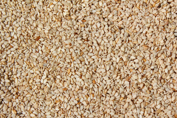 Heap of organic natural sesame seeds