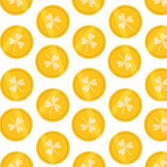 A pattern of yellow coin with a clover on the top.