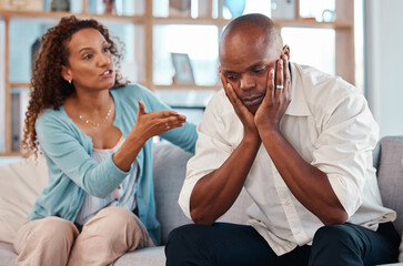 Couple, fight and angry on sofa for marriage problems, conflict and bad communication. Divorce,...