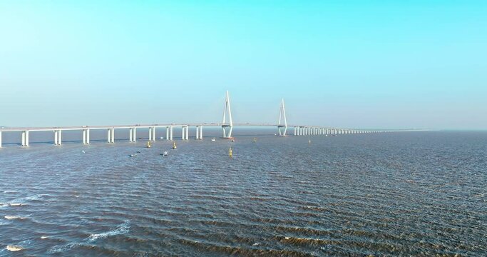 Aerial view of Hangzhou Bay Bridge scenery in Jiaxing, Zhejiang Province, China. The total length of the bridge is 36 kilometers. The design speed is 100 kilometers per hour. 