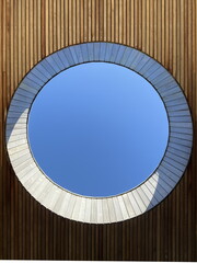 Looking at the sky through a round window in the  seeling at Filsoe nature center