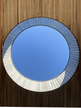 Looking at the sky through a round window in the  seeling at Filsoe nature center