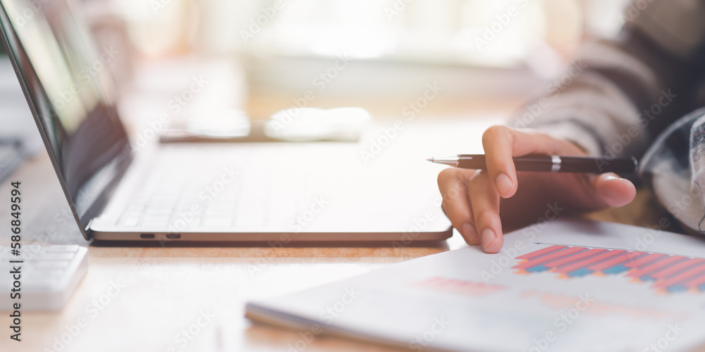 Aufkleber businessman reading graph report and business statistics charts ,analysis and improvement of corpora