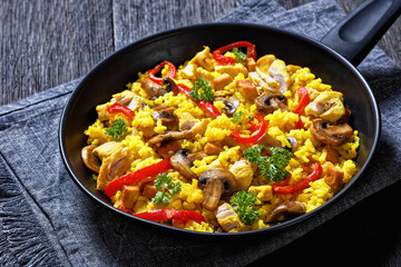 Chicken Paella with mushrooms, red pepper, spices