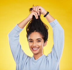 Young woman, haircare and playful, smile in portrait and hair in air with gen z and fashion on...