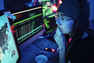 Woman, computer and hacker thinking with headphones and programming for cybersecurity. Music, radio...