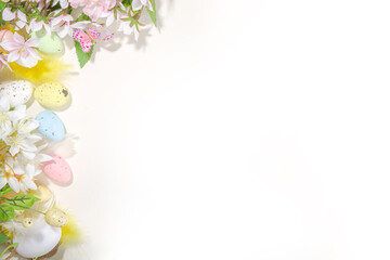 Easter holiday background with flowers and eggs