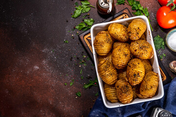 Hasselback potatoes it baking tray