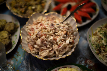 Salad on table. Food on plate. Festive table.