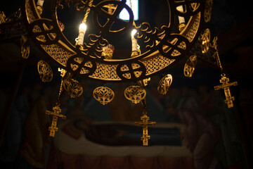 Chandelier in Church. Golden chandelier in temple. Interior of religious building.