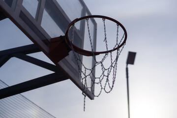 Basketball hoop on a blue sky