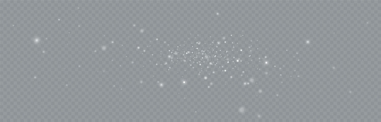 Particles of white magic dust. Shining light particles.Christmas glitter particles. Light effect on a transparent background