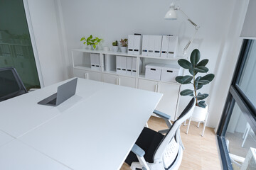 An interior of a modern home office, a small business that is just getting off the ground.