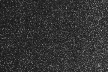 Fototapeta premium Abstract black gold luxurious festive glamor glitter texture background sparkles