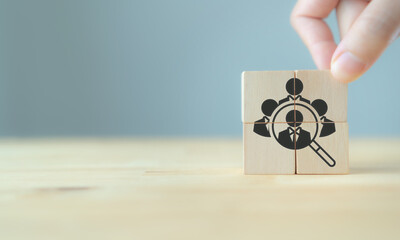 Recruitment and HRM concept. Job search,headhunting and recruitment process. Puting the wooden cube...
