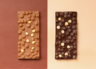 Two chocolate bars on a brown and beige background.