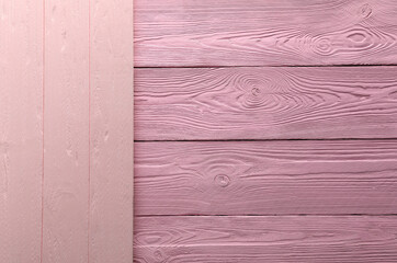 Pink wooden surfaces as background, top view