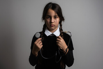 Wednesday student girl with a stethoscope