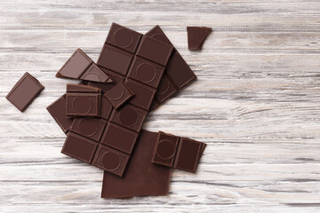 Black chocolate on a gray background