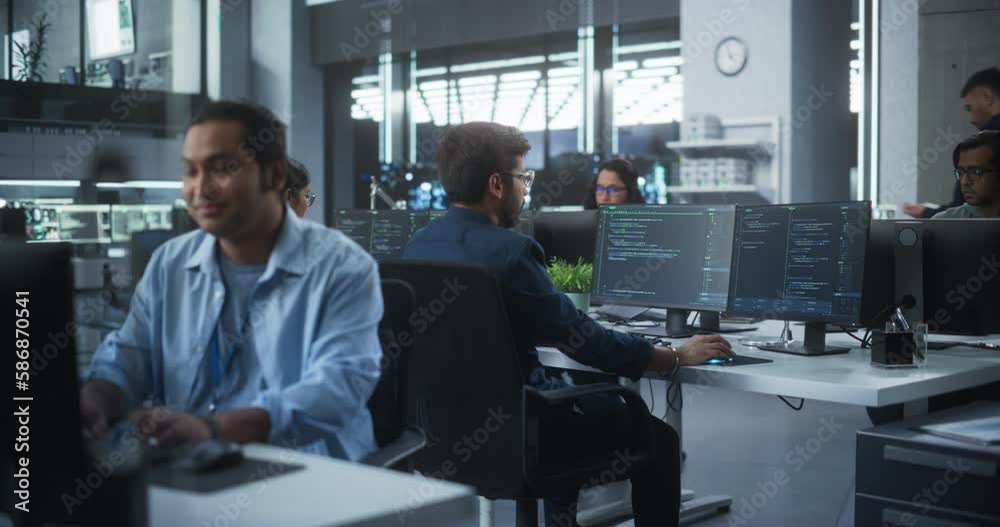 Aufkleber Young Team of South Asian Specialists Working on Computers and Having a Conversation at a Workplace. Two Male Software Developers Discussing a Solution for Their Artificial Intelligence Project
