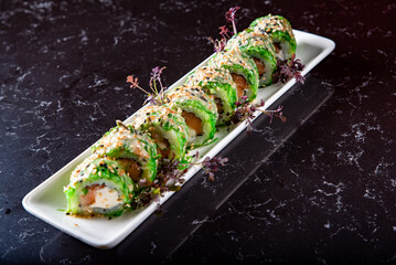 set of sushi roll in plate