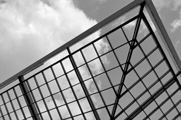 black and white industrial background with a building's metal lines