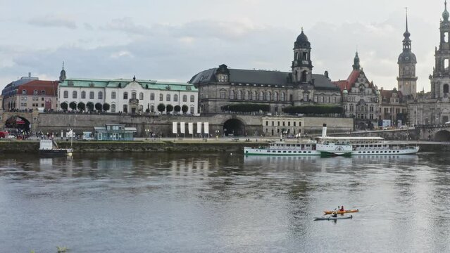 Two kayakers ride on the river elbe in Dresden. Still shot