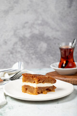 Bread kadayif with cream. Bread kadayif stuffed with cream in the middle. Traditional Turkish cuisine delicacies. close up. Local name ekmek kadayifi
