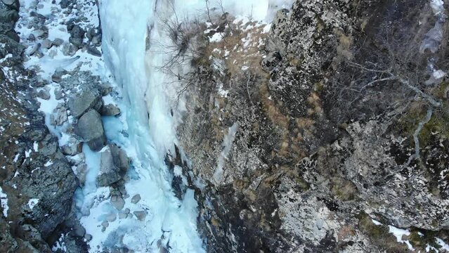 Caucasus, North Ossetia. Digoria Gorge. Ice in the valley of the river Gebi.