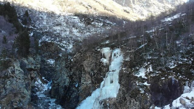 Caucasus, North Ossetia. Digoria Gorge. Ice in the valley of the river Gebi.