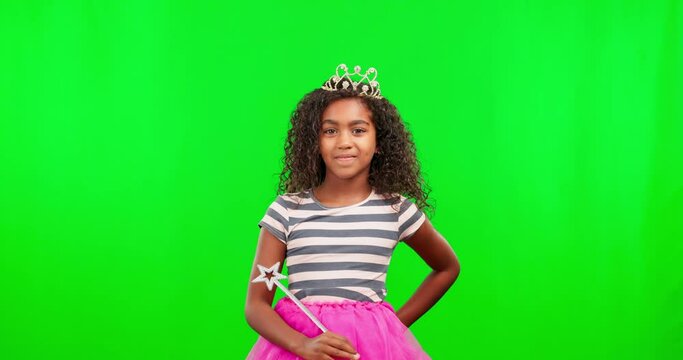 Girl at costume party for children with magic wand, crown and green screen and princess dress up in studio. Fantasy, play and smile, child with and happiness in fun mockup space, spell games for kids