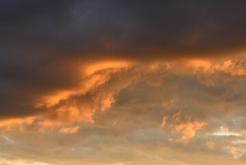 Amazing clouds in the sky during sunset, natural background