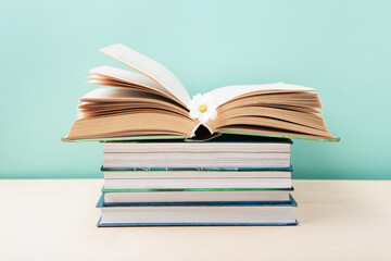 World book and Copyright day, Education concept on Blue Mint Background.