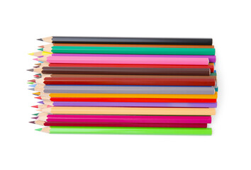 Fototapeta premium Pile of colorful wooden pencils on white background, top view