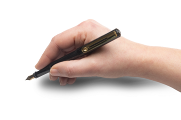 Woman using a fountain pen to write or sign