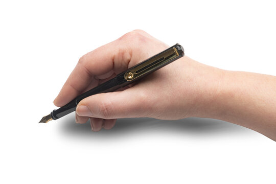 Woman using a fountain pen to write or sign