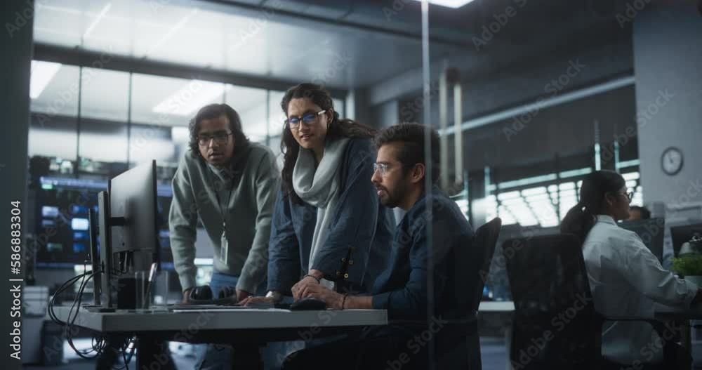 Aufkleber Group of Three Young Indian Software Engineers Use Computer to Discuss a Technological Project in Modern Industrial Office. Group of Male and Female Scientists Work in Research and Development Center