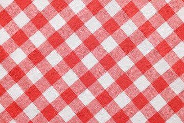 Red checkered tablecloth as background, top view - obrazy, fototapety, plakaty