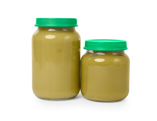 Glass jars with healthy baby food isolated on white