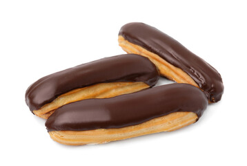 Delicious eclairs covered with chocolate isolated on white