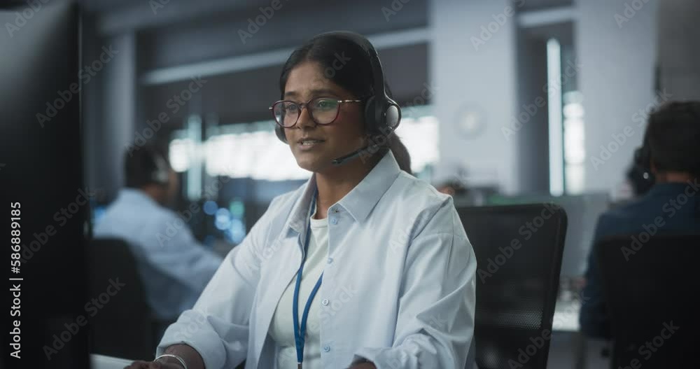 Aufkleber portrait of a smart young indian specialist working in a technological startup help desk department,