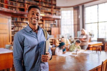Portrait of African American student in library.