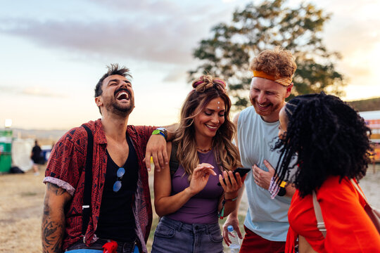 Two couples together at festival